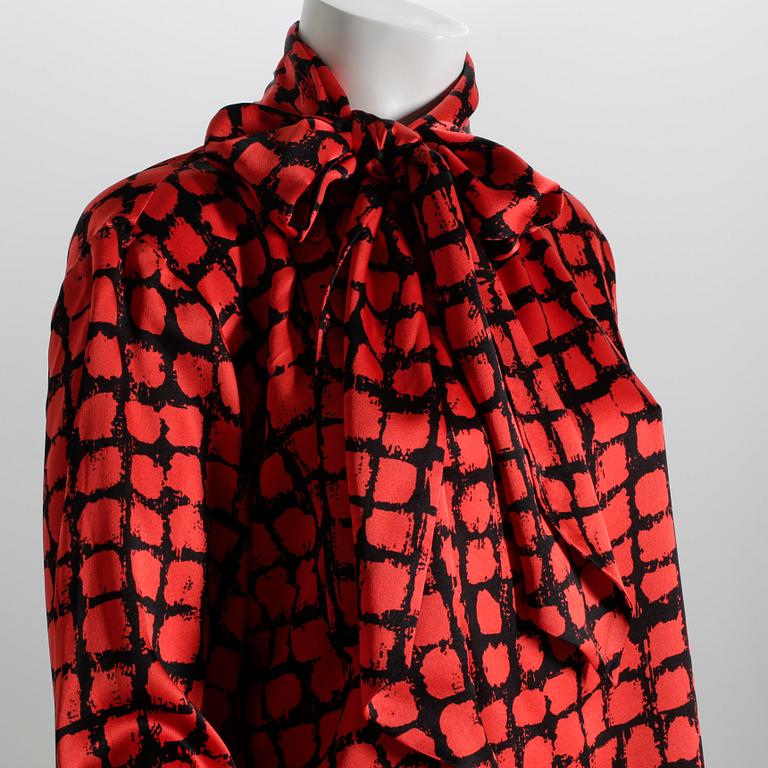 KNYTBLUS, Yves Saint Laurent.