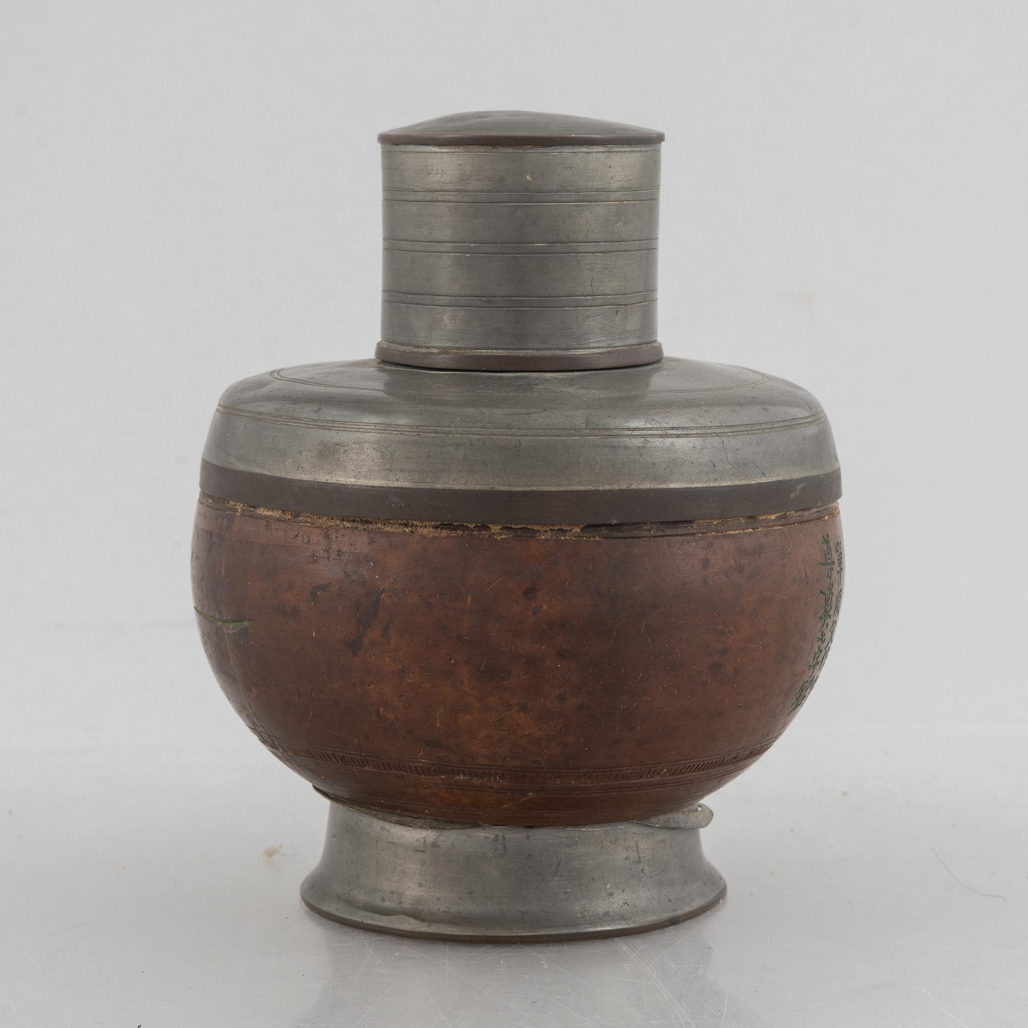 A Chinese pewter and wood tea caddie, early 20th century.