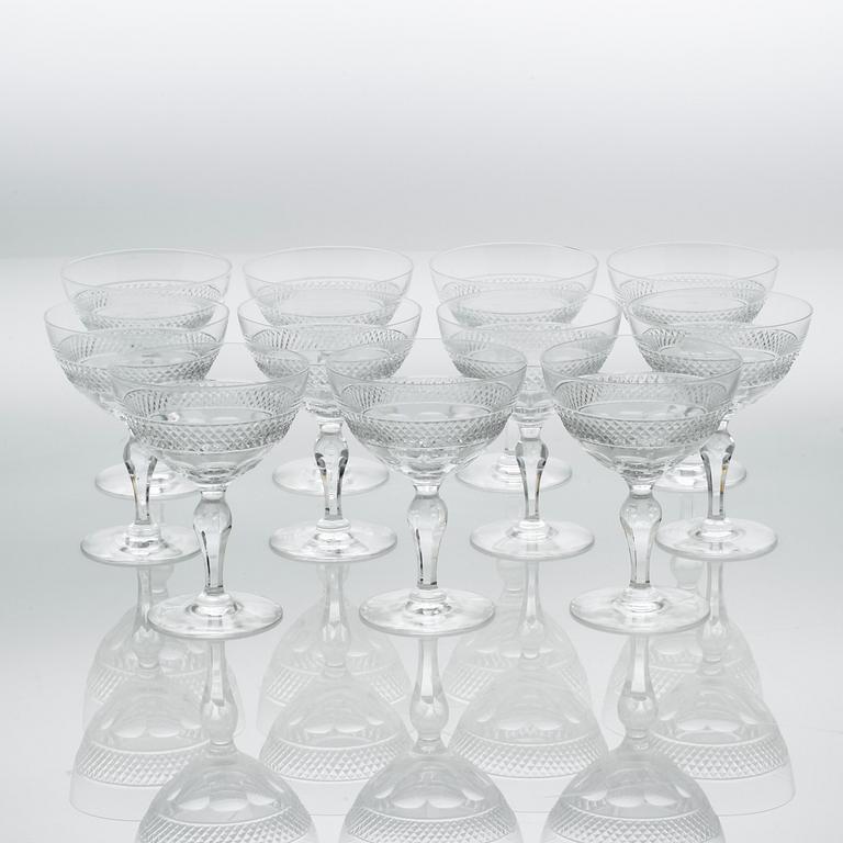Eleven glass champagne cups, around mid 20th century.