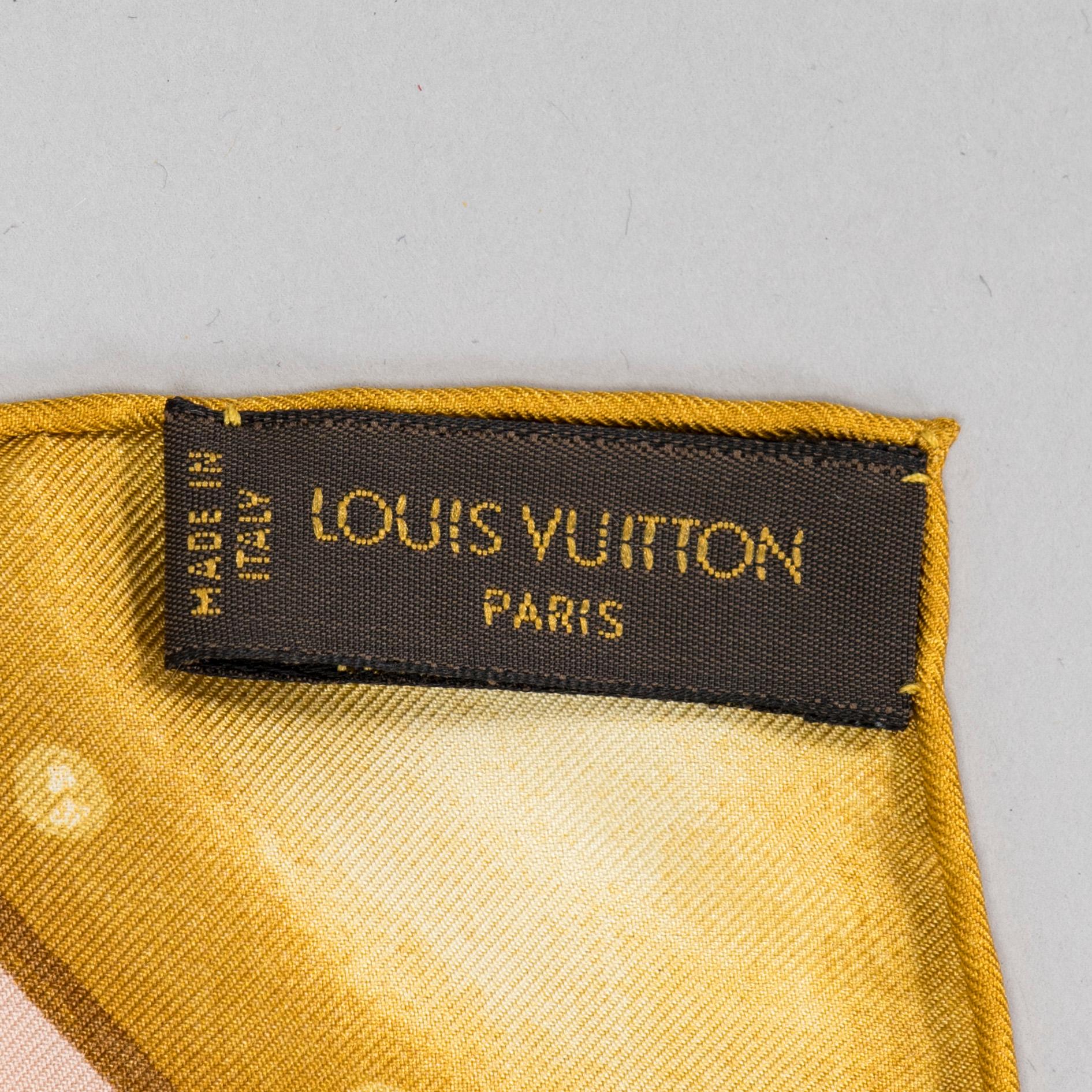 Louis Vuitton, a silk scarf.