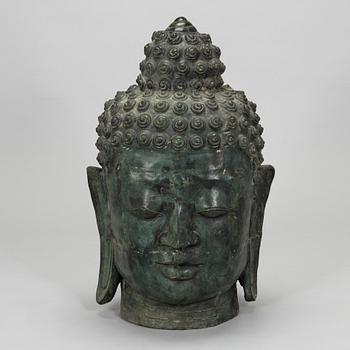 A Buddha sculpture, later half of the 20th century.