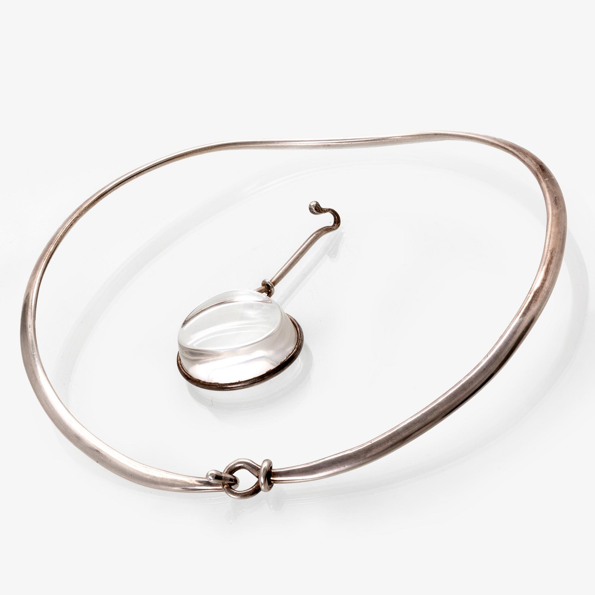 Vivianna Torun Bülow-Hübe. Necklace with pendant, sterling silver and rock crystal or glass.