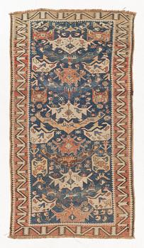 An oriental rug, c. 200 x 115 cm.