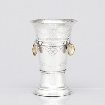 An 18th century silver beaker, unidentified makers mark.