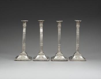 795. A set of four English silver candlesticks, marks of William Holmes, London 1772.