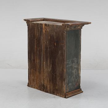 A Swedish provincial wall hanging cabinet, 1833.