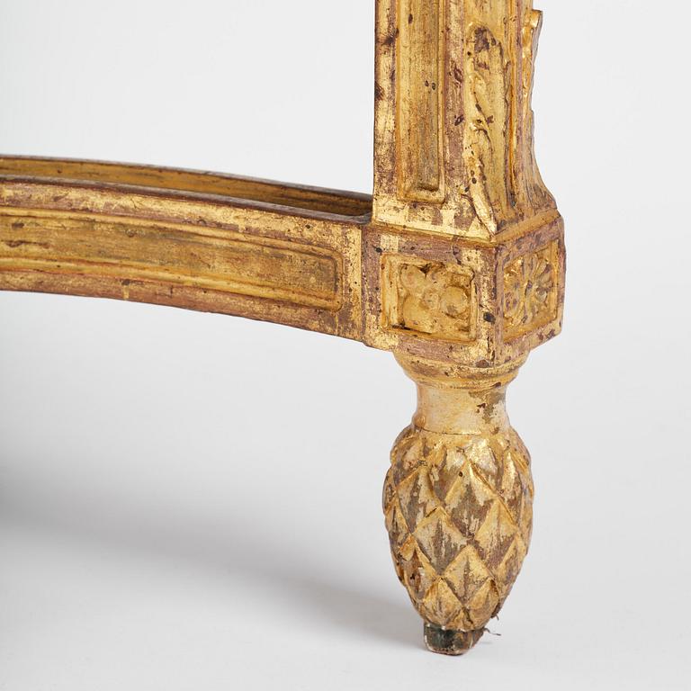 A Gustavian carved giltwood console table, Stockholm, late 18th century.