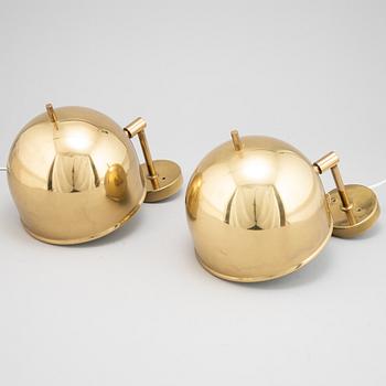 Eje Ahlgren, a pair of brass wall lamps, model V-75, Bergboms.
