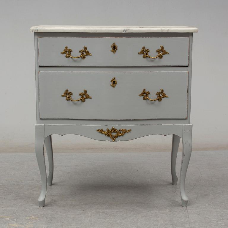 A Rococo style chest of drawers, second half of the 20th century.