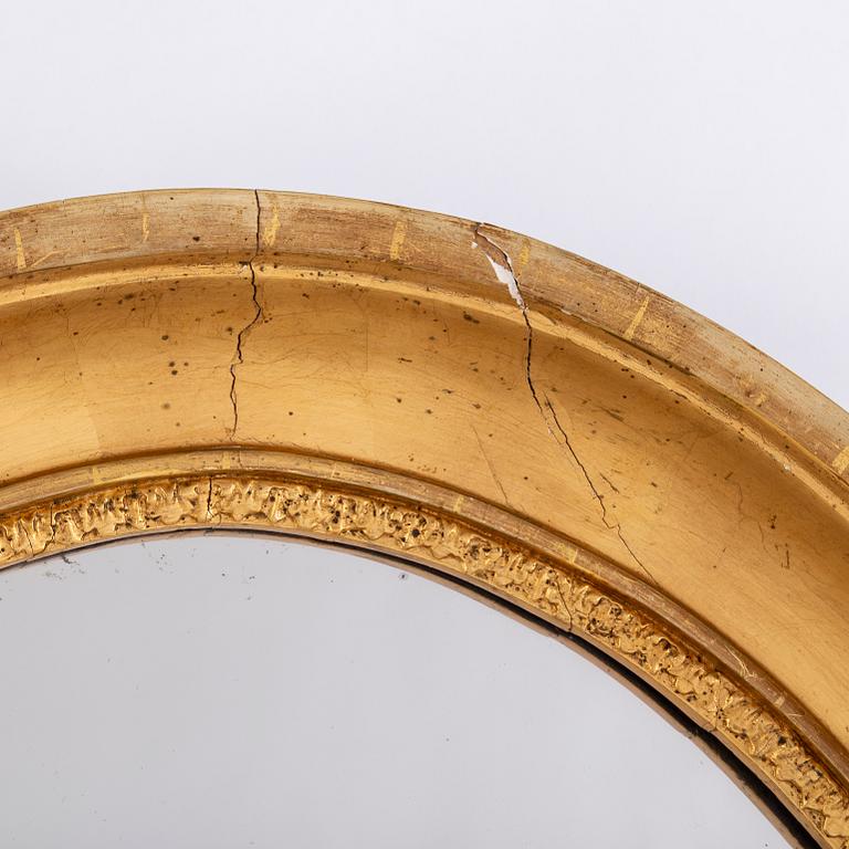 A gilt mirror, second half of the 20th Century.