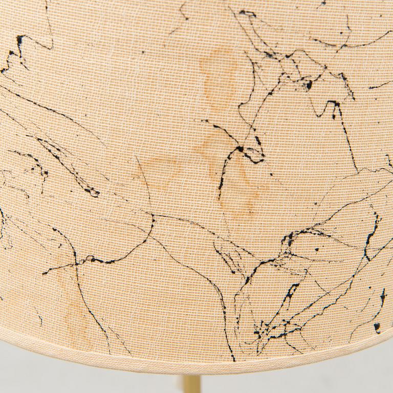 A mid-20th Century floor lamp.