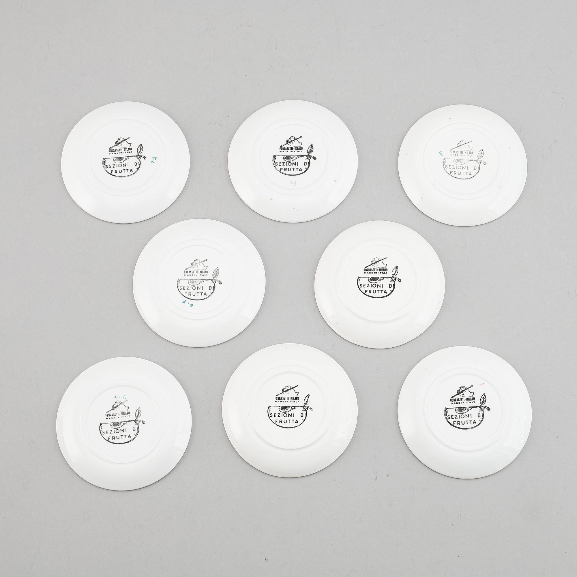 Piero Fornasetti, eight ceramic coasters, Milan, Italy.