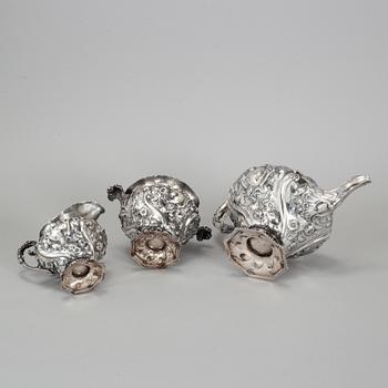 A silver tea pot, sugar bowl and creamer, Charles Fox II, London 1832.