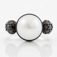 Ring, Autore in 18K white gold with a cultured South Sea pearl, black diamonds, and enamel,