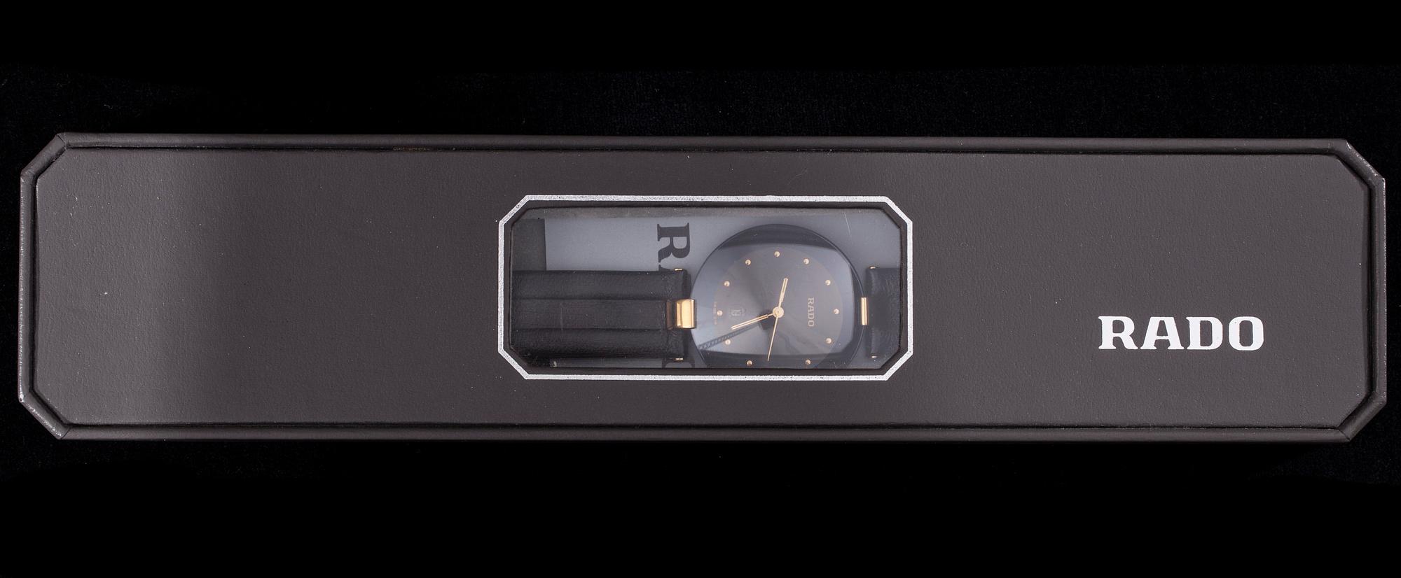 ARMBANDSUR, Rado, svart läderarmband, originaletui. Garantikort 1990.