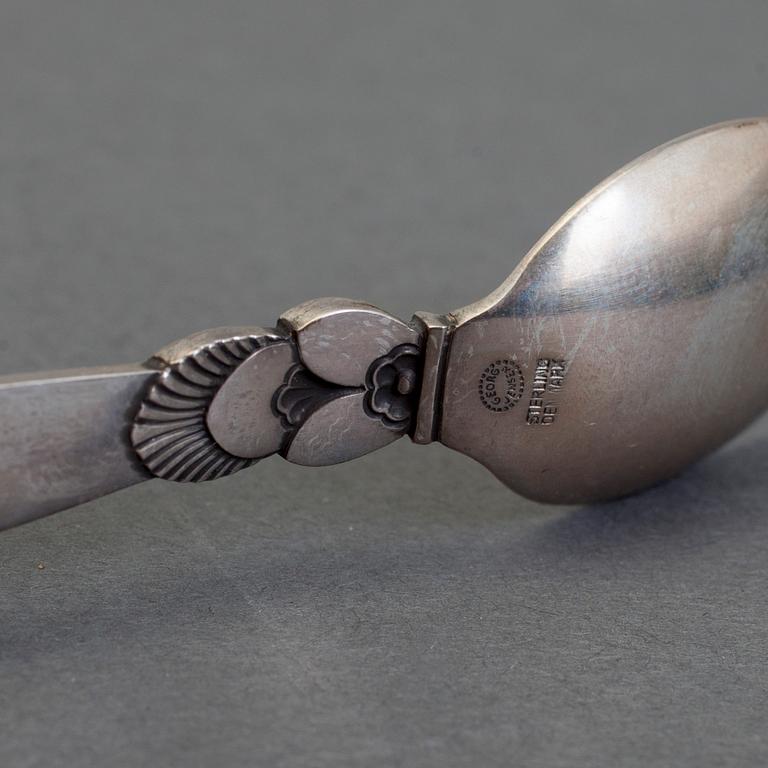 A set of 12+6 spoons by Georg Jensen,