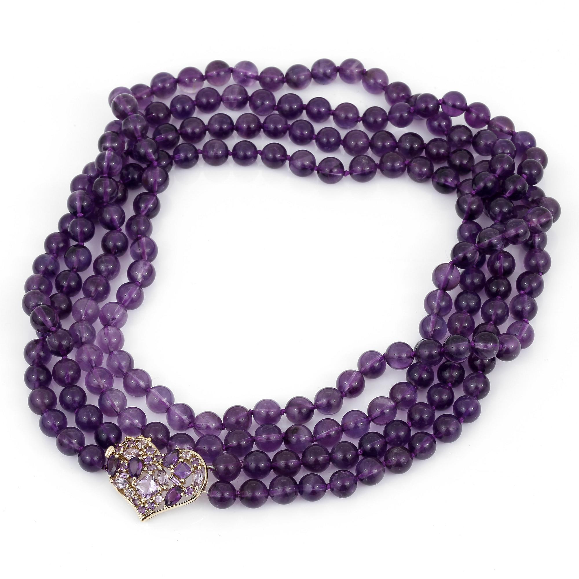 HALSBAND, med ametist kulor och fasetterade ametister.