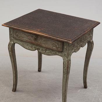 A french rococo-style table, 19th century.