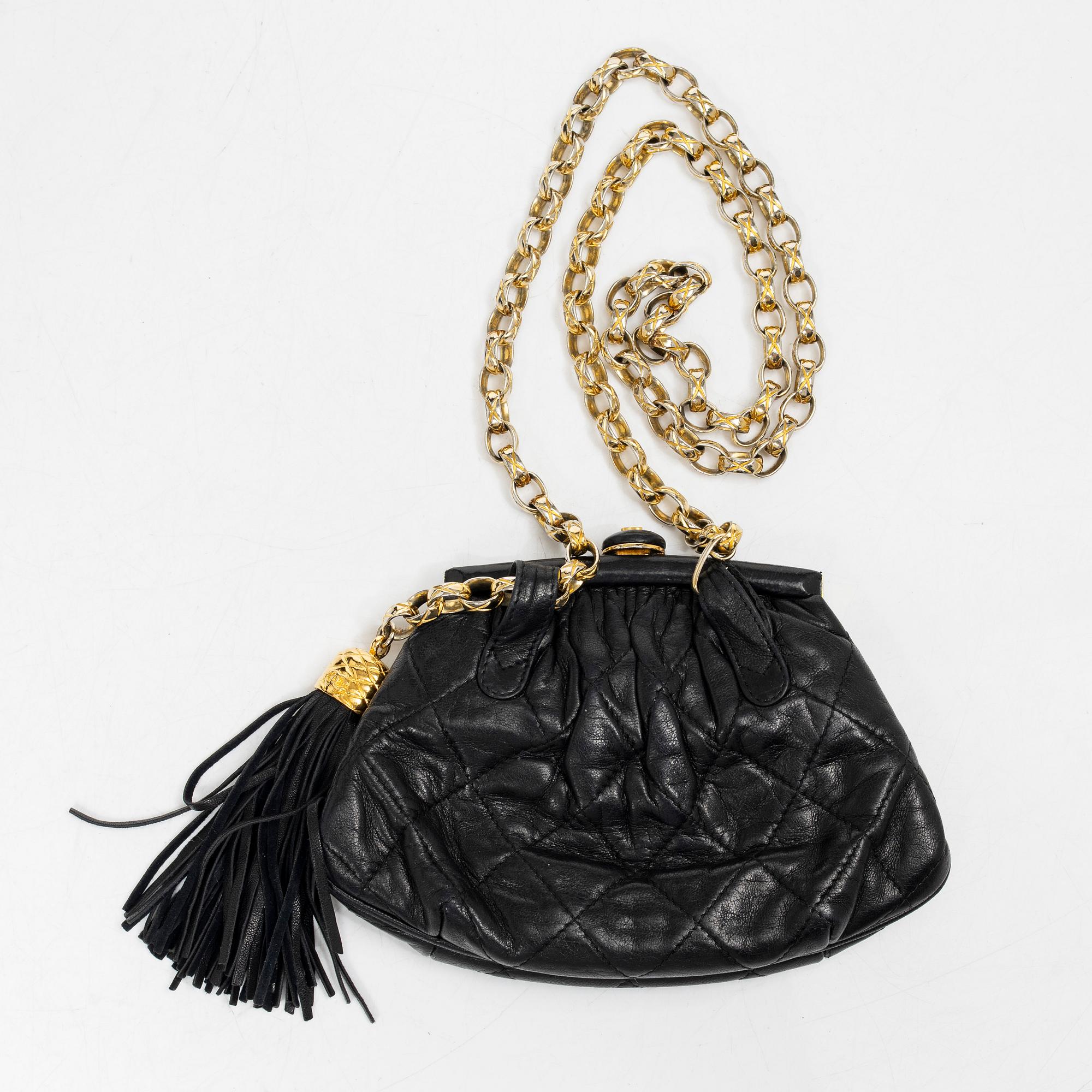Chanel, A black leather vintage pouch, 1989-1991.