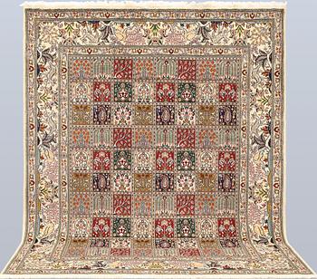 A part silk Moud rug, approx. 250 x 199 cm.