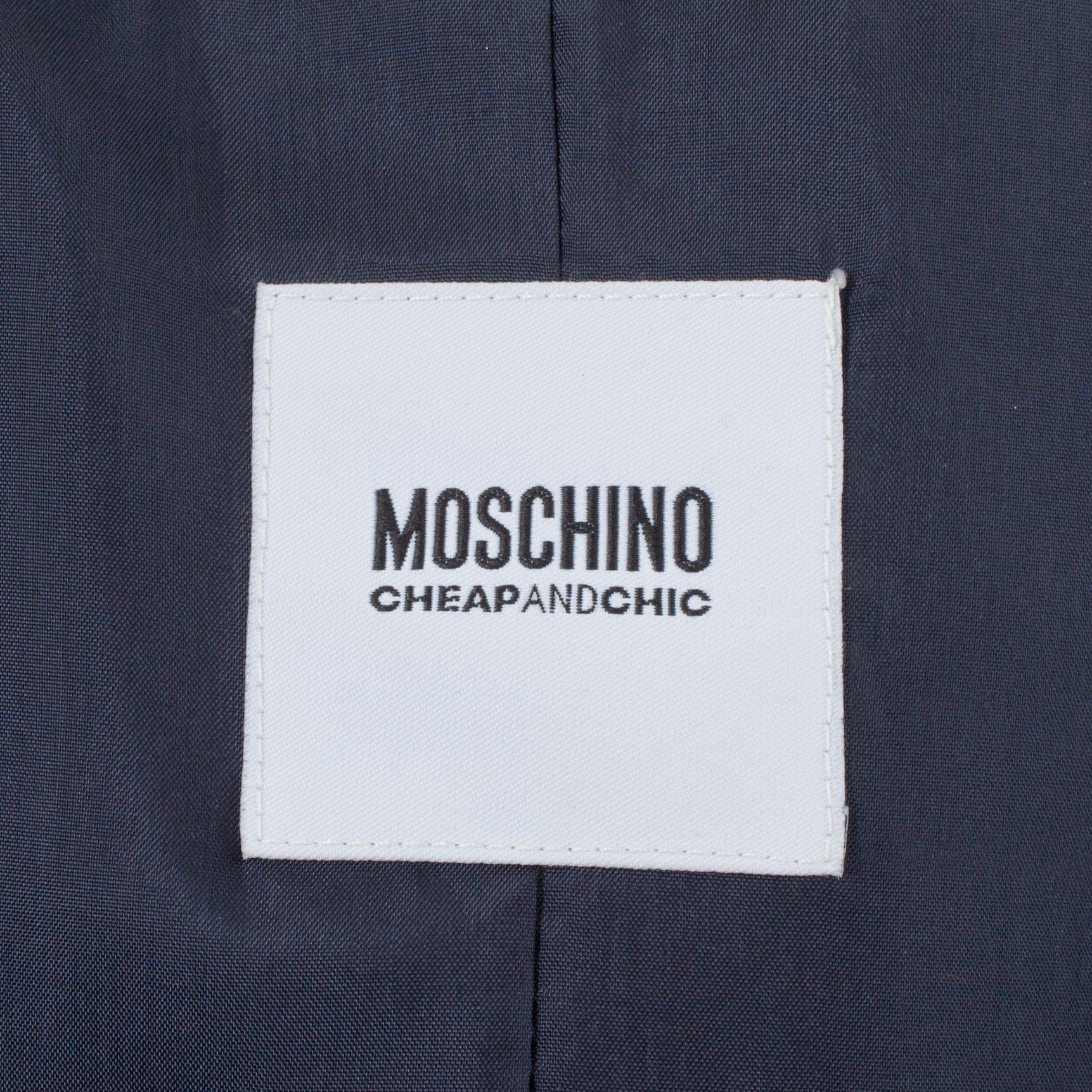 MOSCHINO, a two-piece suit consisting of jacket and pants.