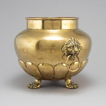 A 19th century brass flower pot.