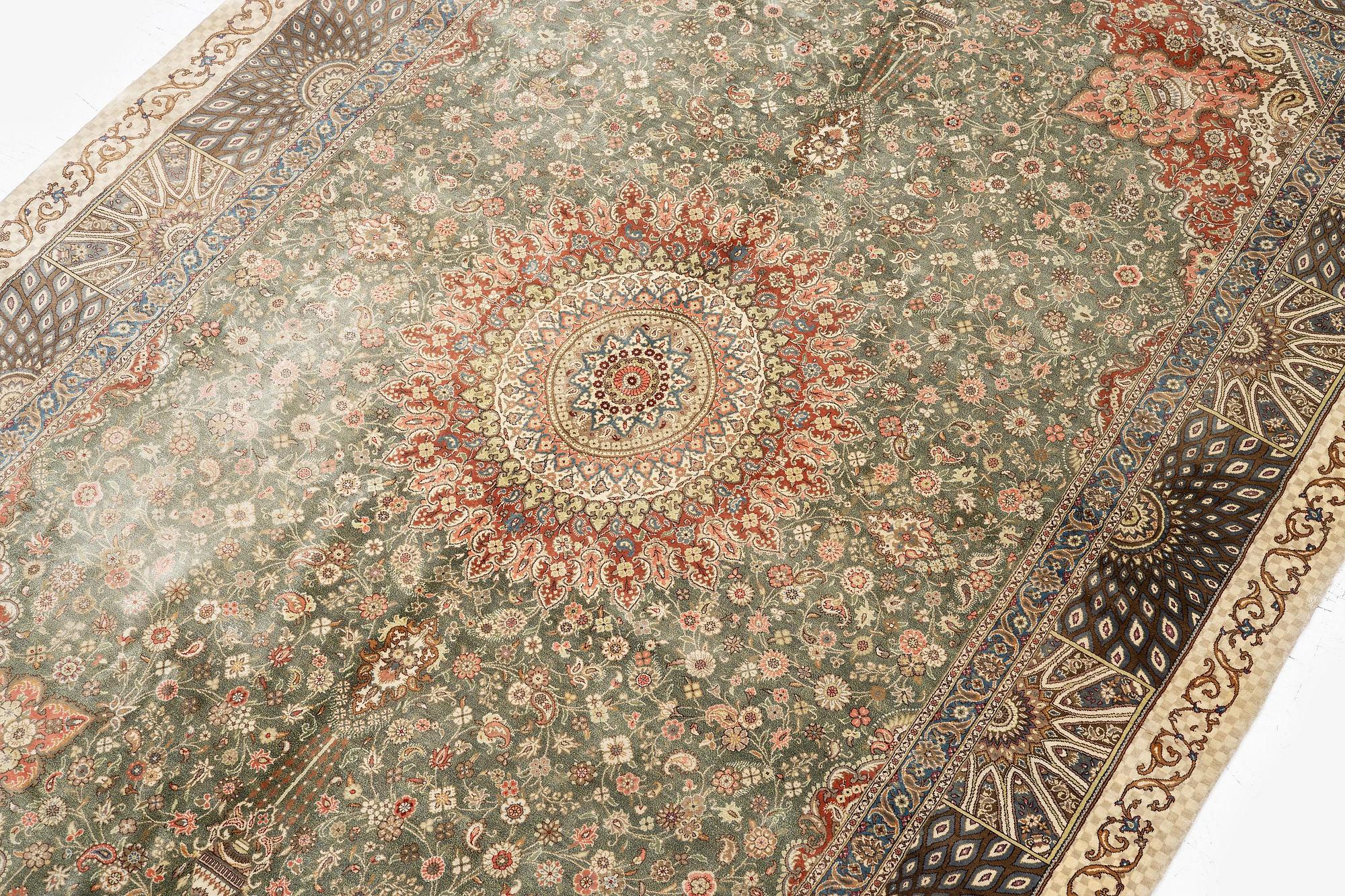 A silk Qum, Central Persia. signed Mohammad Gamshidi, c. 203 x 126 cm.