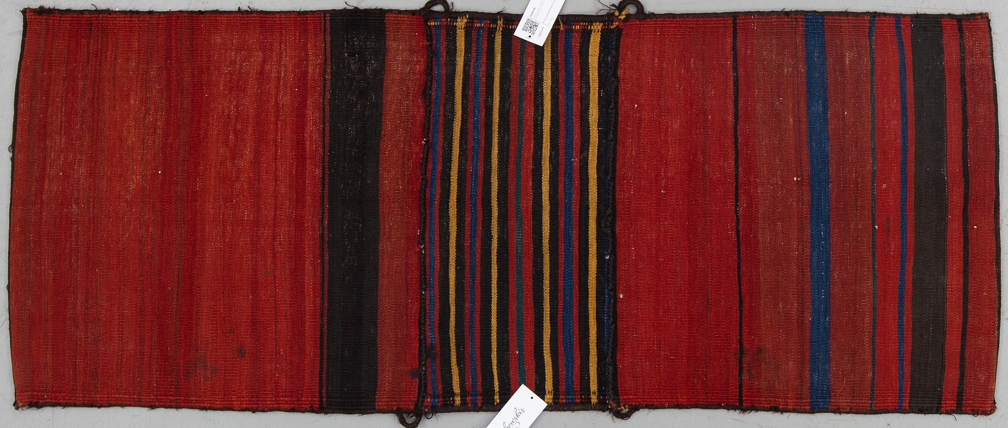 A baluch saddelbag, circa 154 x 63 cm.