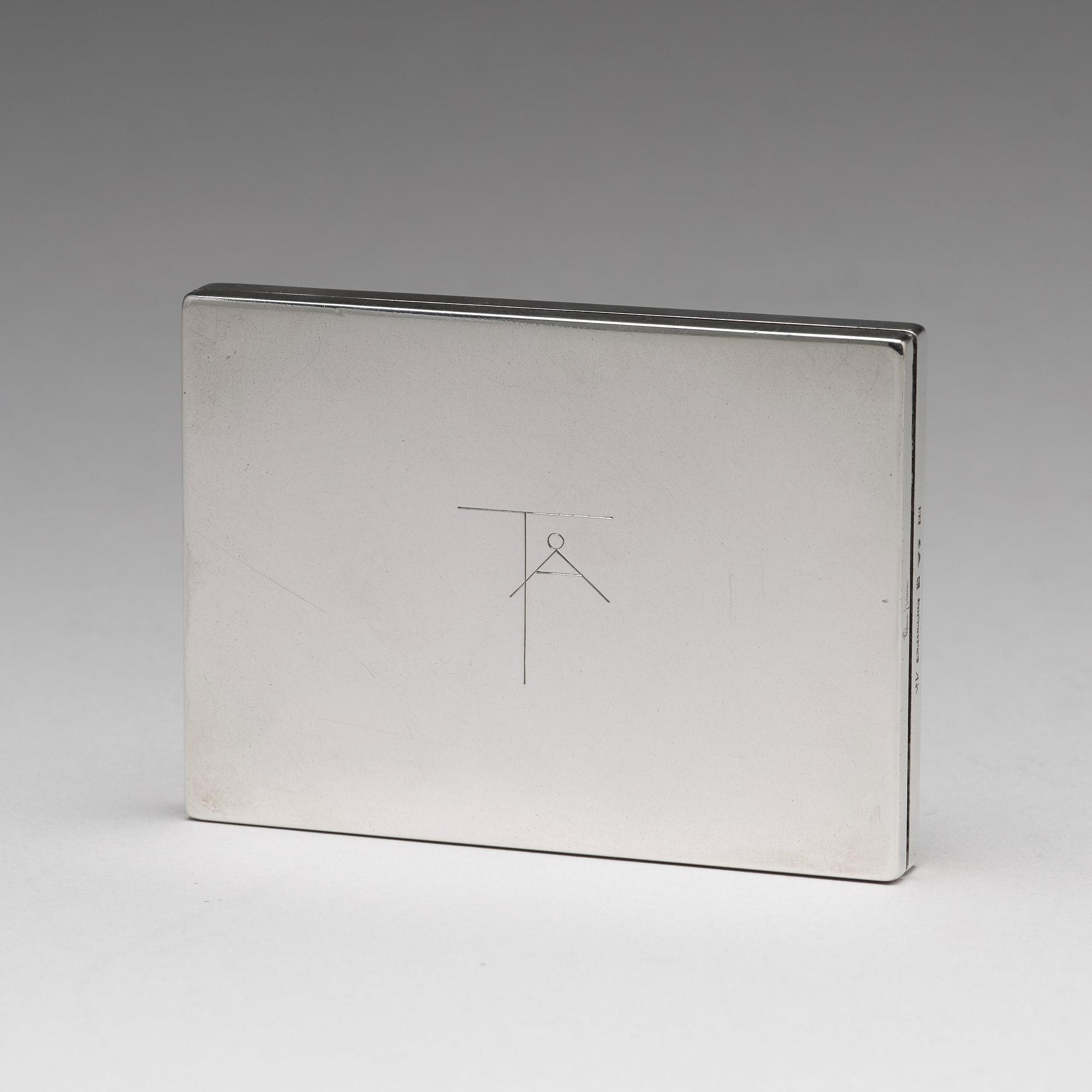 Wiwen Nilsson, a silver set with a pair of candlesticks and a cigarette case, Lund Sweden 1927-38.