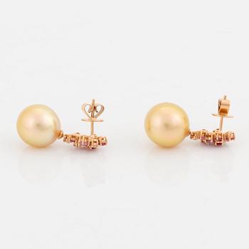 A pair of 18K rose gold cultured South Sea pearl earrings.