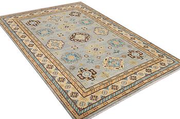 A Kazak carpet, c. 295 x 206 cm.
