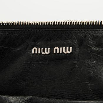 Miu Miu, A 'Bow Satchel' bag.