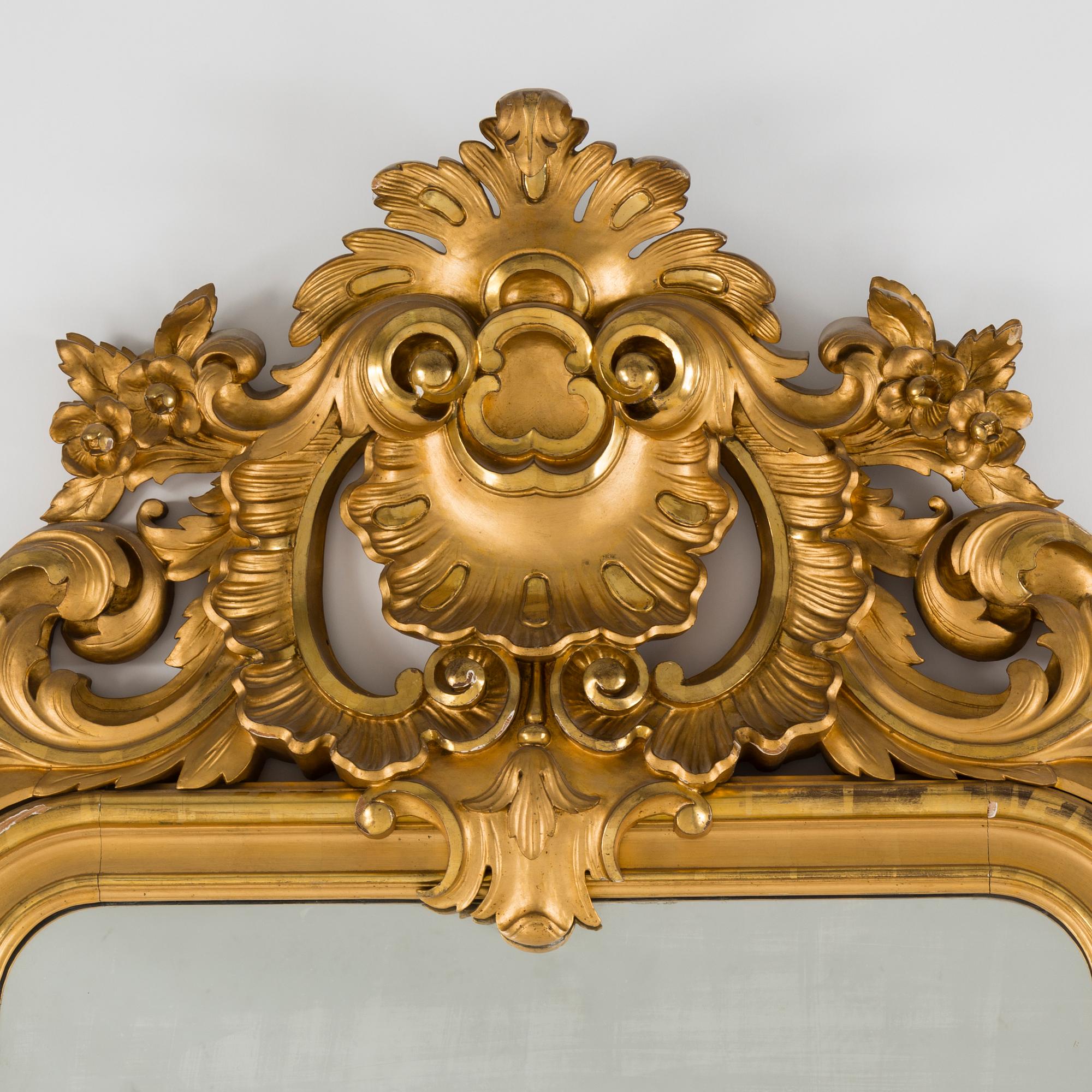 A gilt wood mirror and marble top console table, early 20th Century.