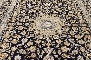 A Keshan carpet, c. 365 x 259 cm.