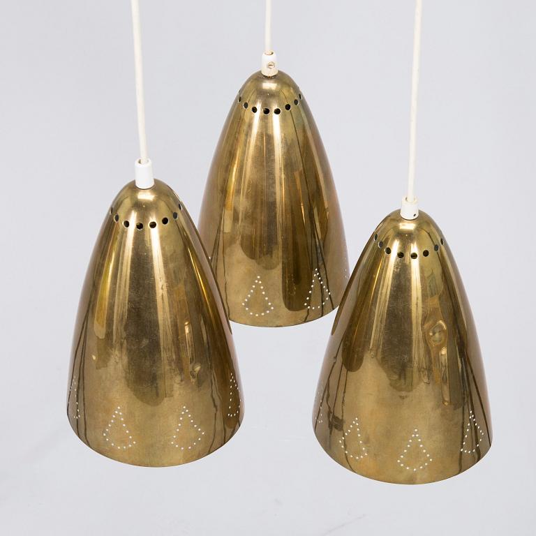 A mid-20th-century brass pendant ceiling light.