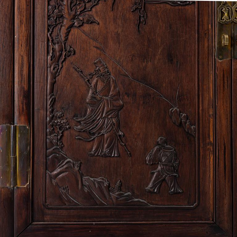A hardwood cabinet, China, 20th century.