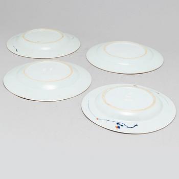 A set of eight odd imari dinner plates, Qing dynasty, 18th Century.