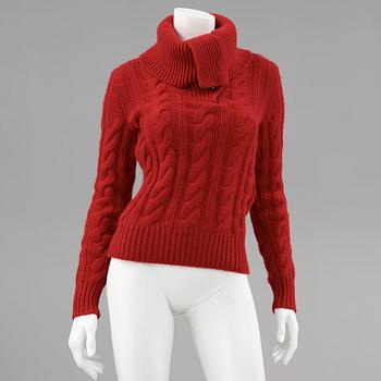 Two knitted sweaters by ralph lauren.