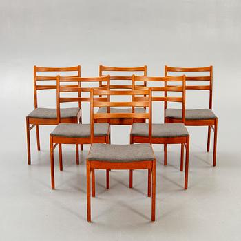 A set of six t1960s teak dining chairs.
