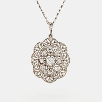 926. A platinum pendant set with old- and rose-cut diamonds.