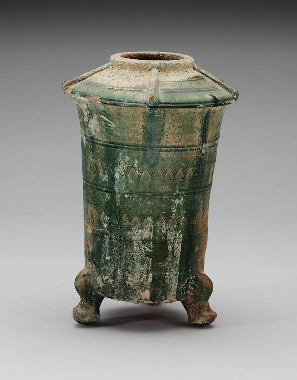 A green glazed pottery silo, Han dynasty (206 BC - 220 AD).