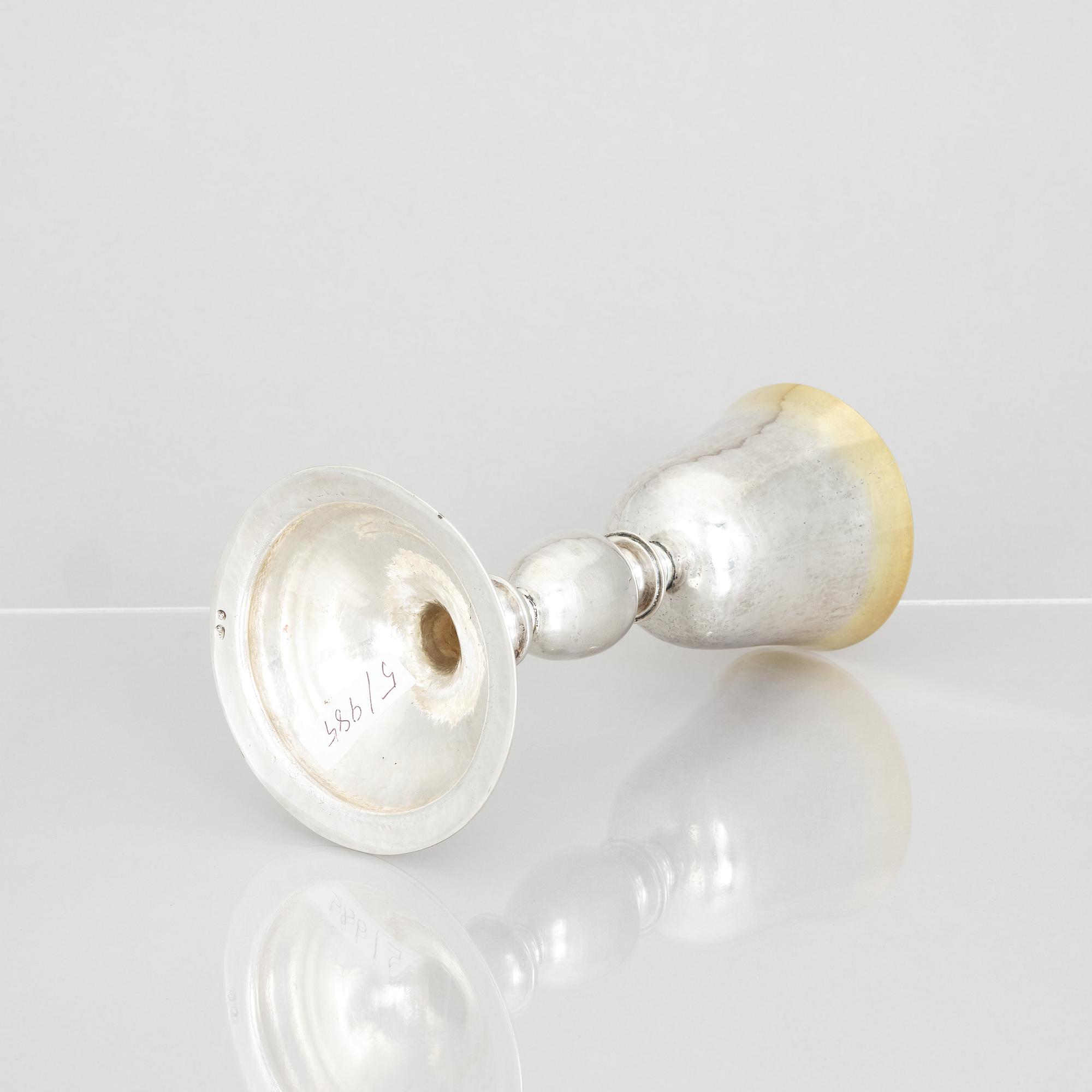 An 18th century parcel-gilt silver cup, makers mark A.M, probably Germany.