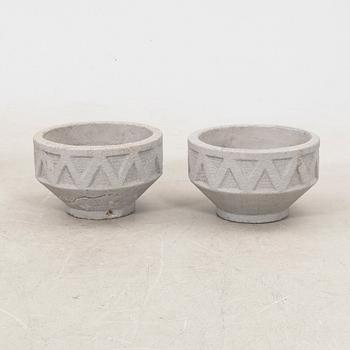 A pair of concrete garden urns later part of the 20th century.