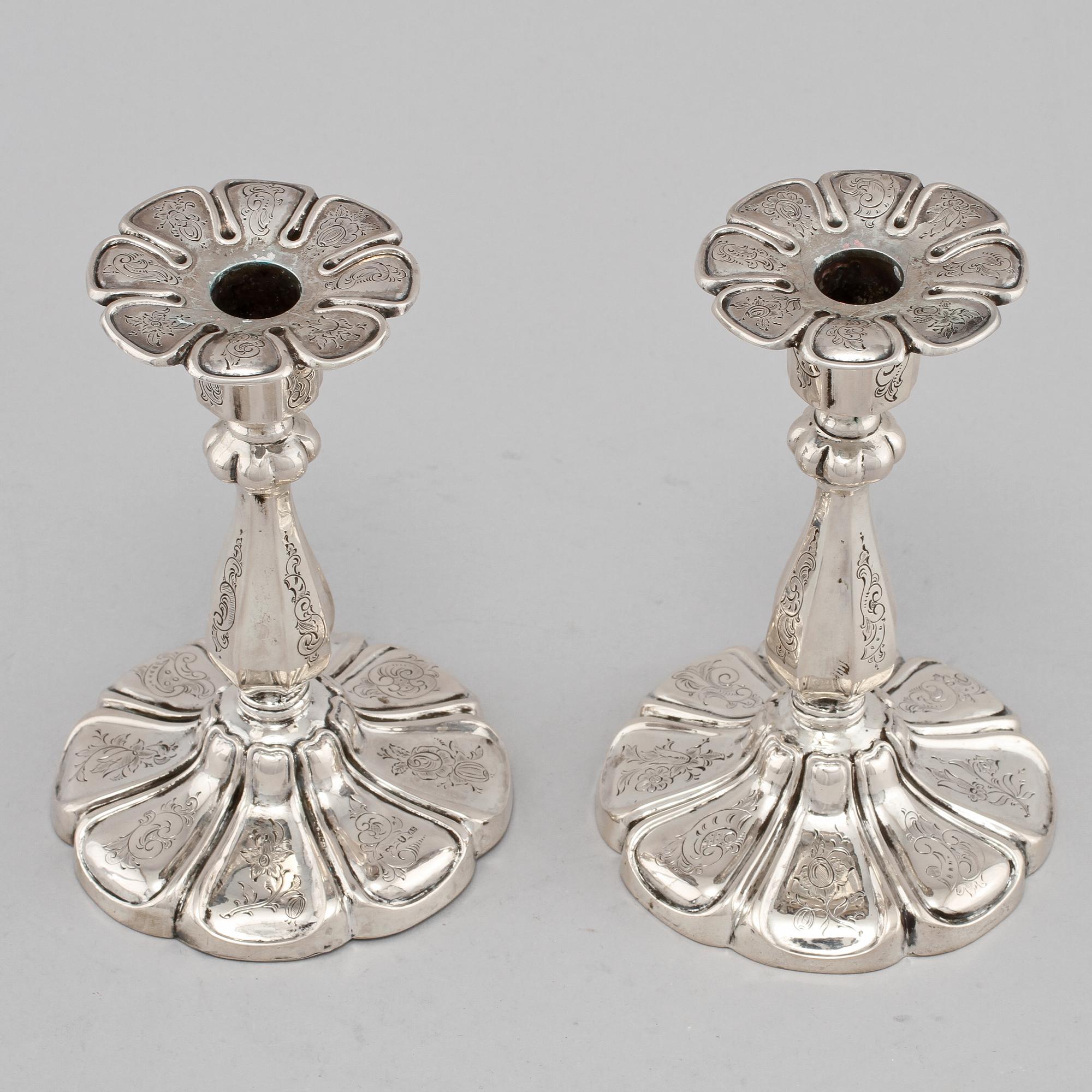 LJUSSTAKAR, ett par, silver, 1900-talets första hälft.