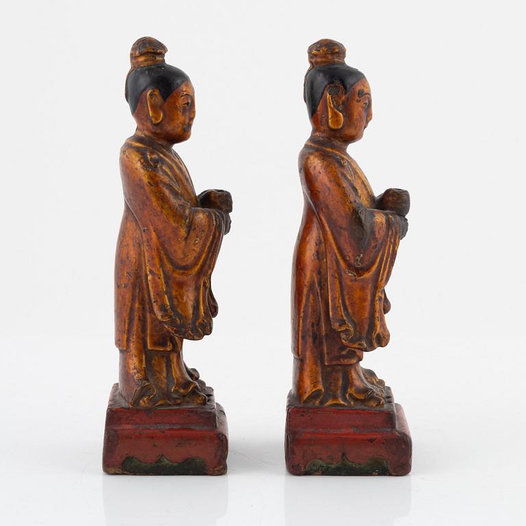 A pair of cold gilt and lacquered wooden joss stick holders, Qing dynasty, 19th Century.