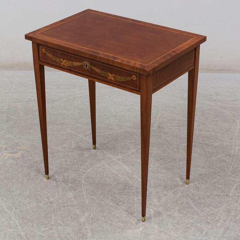 A gustavian style sewing table, early 20th century.