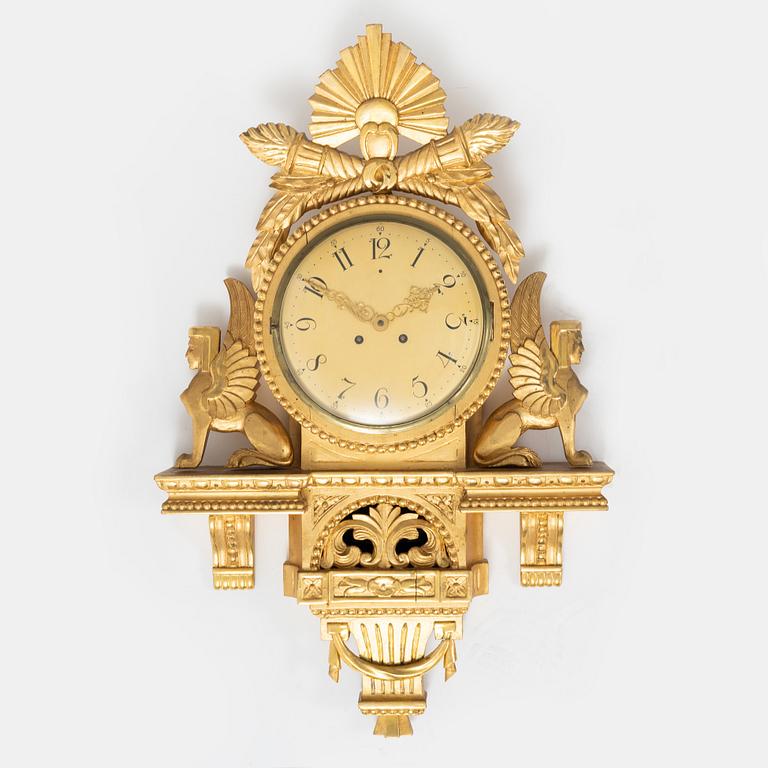An Empire style wall clock, mid 20th century.