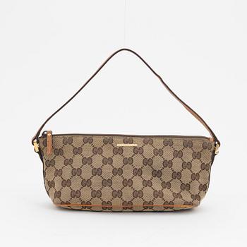 Gucci, a monogram canvas bag.