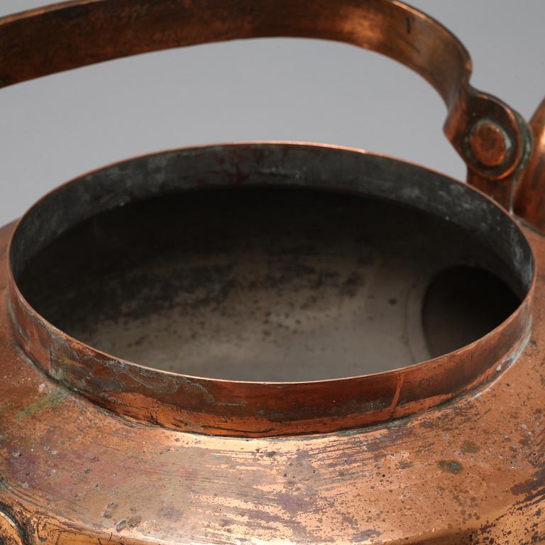 A coffee pot and a ladle in copper from the 19th century.