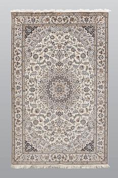 A carpet, Nain part silk so called 6 LAA, signed, ca 240 x 137 cm.